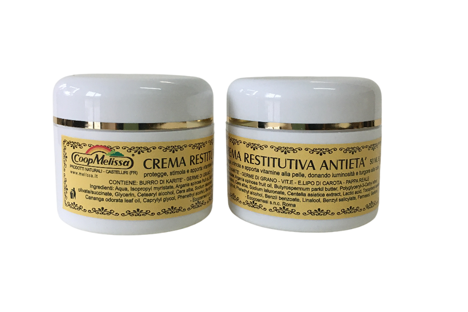 Due vasetti crema antirughe karitu00e8 e pappa reale su fondo bianco